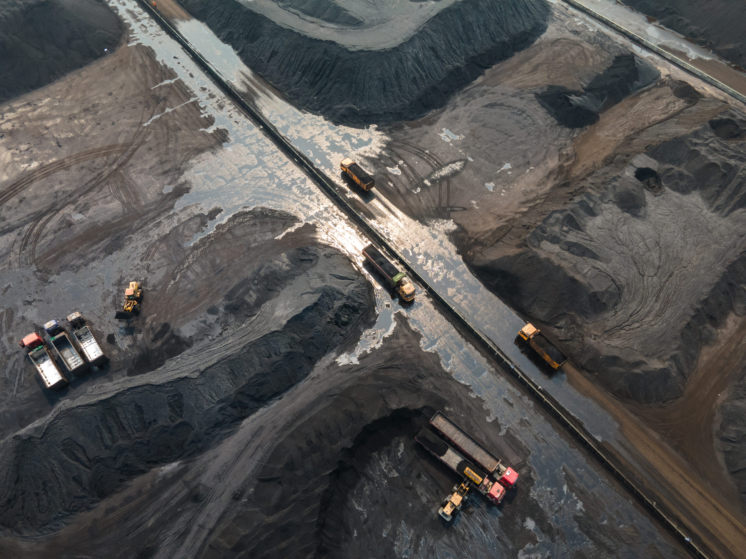 Truck loading and unloading at coal yard